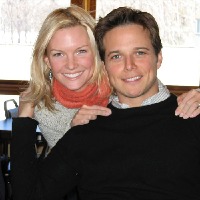 Scott Wolf and wife Kelley Wolf smiling together, after her life-changing diagnosis and emotional apology. Scott Wolf and wife Kelley Wolf smiling together, after her life-changing diagnosis and emotional apology.