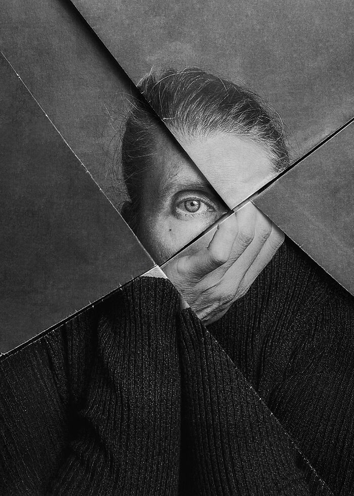 An abstract portrait with a face fragmented by shards, showcasing an extraordinary image from the Minimalist Photography Awards.