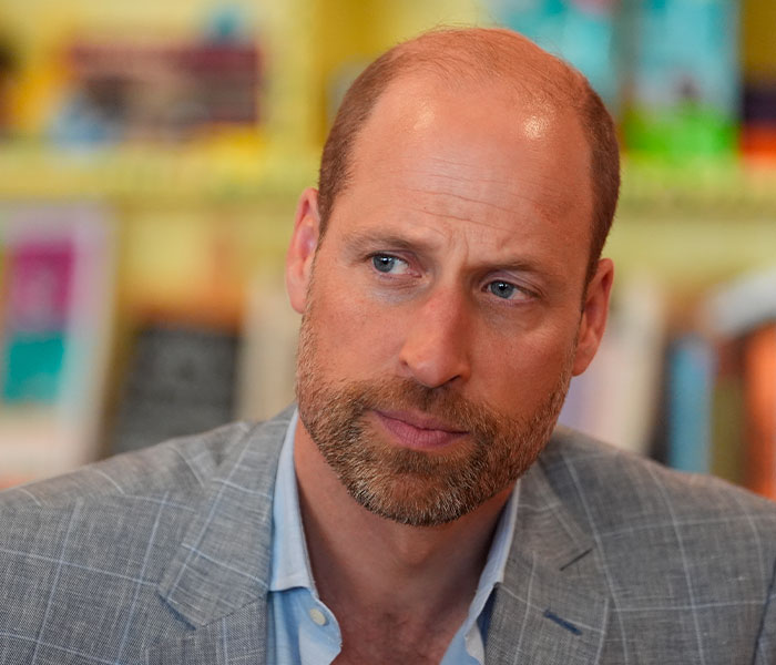 Close-up of Prince William, looking thoughtful, potentially reflecting tension. Close-up of Prince William, looking thoughtful, potentially reflecting tension.