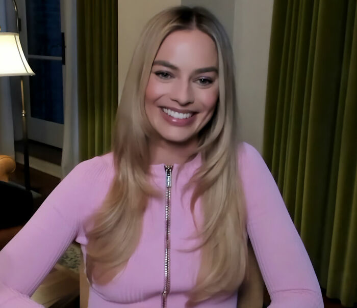 Margot Robbie smiling for the camera, amidst discussions about her rumored role in a blockbuster franchise. Margot Robbie smiling for the camera, amidst discussions about her rumored role in a blockbuster franchise.