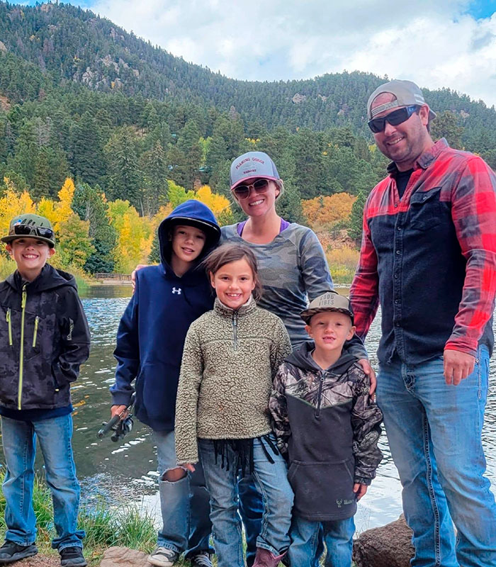 A mom-of-four with her family on a camping trip, attacked by spiders, now fighting for her life in hospital.