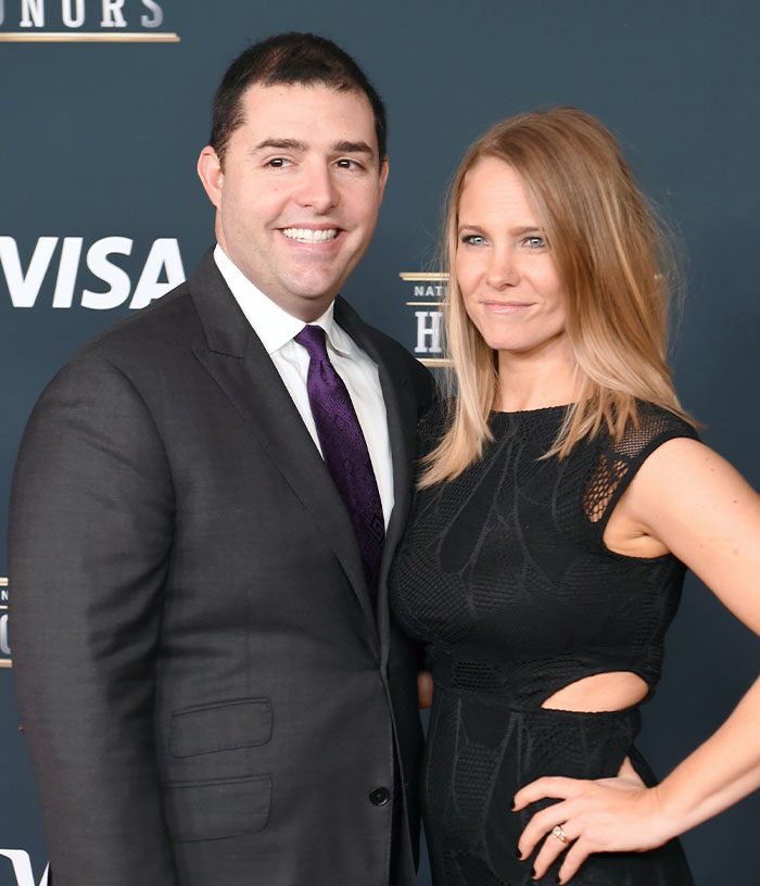 Jed York and his partner posing on a red carpet, showcasing the 49ers owner in a social setting.