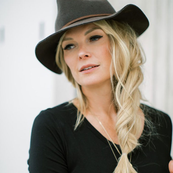 Kelley Wolf, Scott Wolf's wife, wearing a hat, discussing her life-changing diagnosis and emotional apology. Kelley Wolf, Scott Wolf's wife, wearing a hat, discussing her life-changing diagnosis and emotional apology.