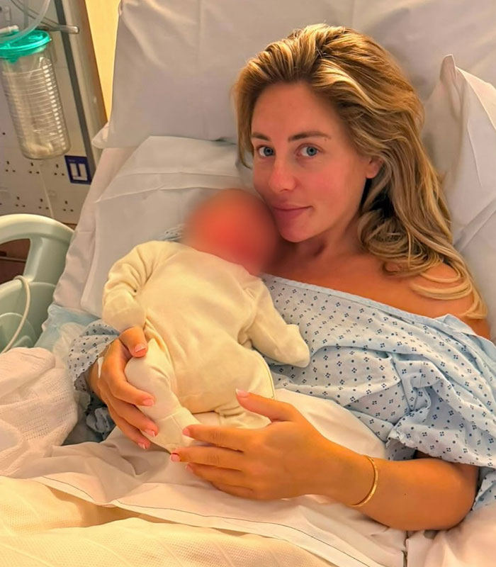 Bonnie Blue smiles while holding her healthy baby in the hospital, father's identity remains a mystery. Bonnie Blue smiles while holding her healthy baby in the hospital, father's identity remains a mystery.