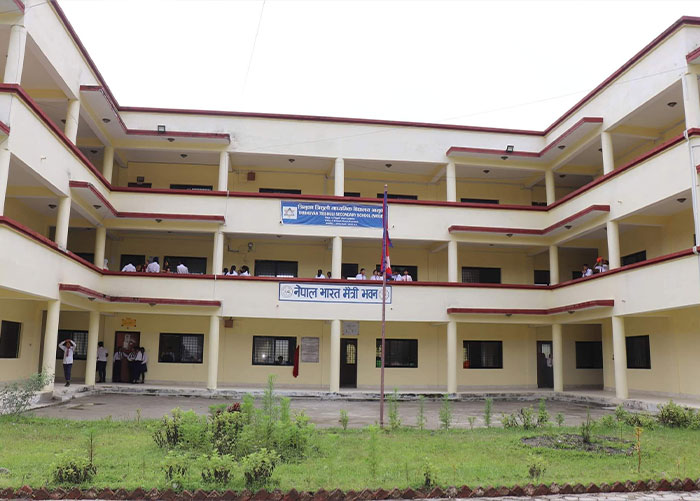An exterior view of the school in Nepal, where the teacher saved children from floods, before it was swept away. An exterior view of the school in Nepal, where the teacher saved children from floods, before it was swept away.