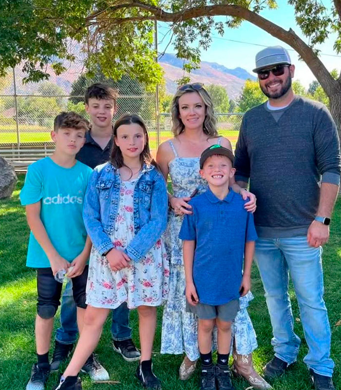 A mom-of-four with her family on a camping trip, attacked by spiders, now fighting for her life in hospital.