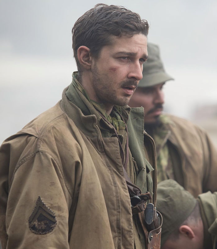 Shia LaBeouf in a military uniform, portraying a tense on-set confrontation with Scott Eastwood. Shia LaBeouf in a military uniform, portraying a tense on-set confrontation with Scott Eastwood.