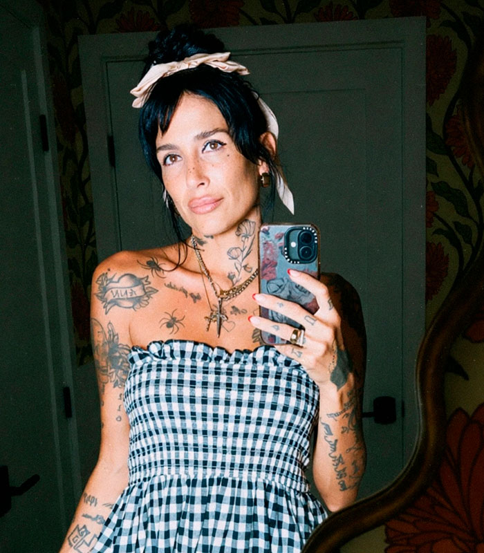 Angelina Jolie's brother's partner takes a mirror selfie, hinting at an emotional live stream.