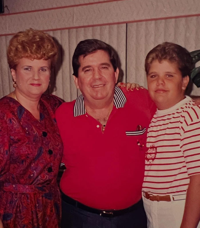 A young Perez Hilton as a child with his parents, revealing a dark childhood secret from his past.