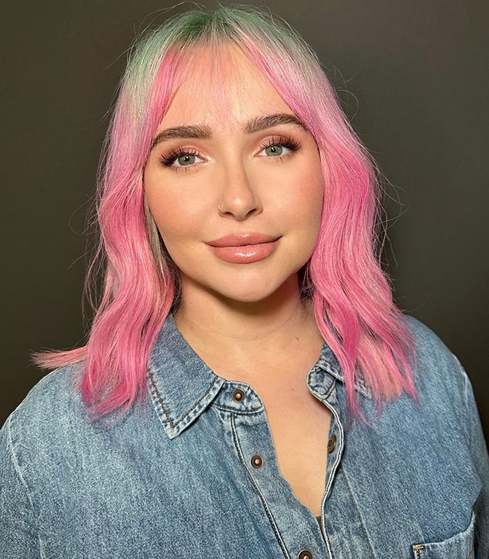 Woman with pink and green hair, wearing a denim shirt, not Hayden Panettiere, in context of autopsy results. Woman with pink and green hair, wearing a denim shirt, not Hayden Panettiere, in context of autopsy results.