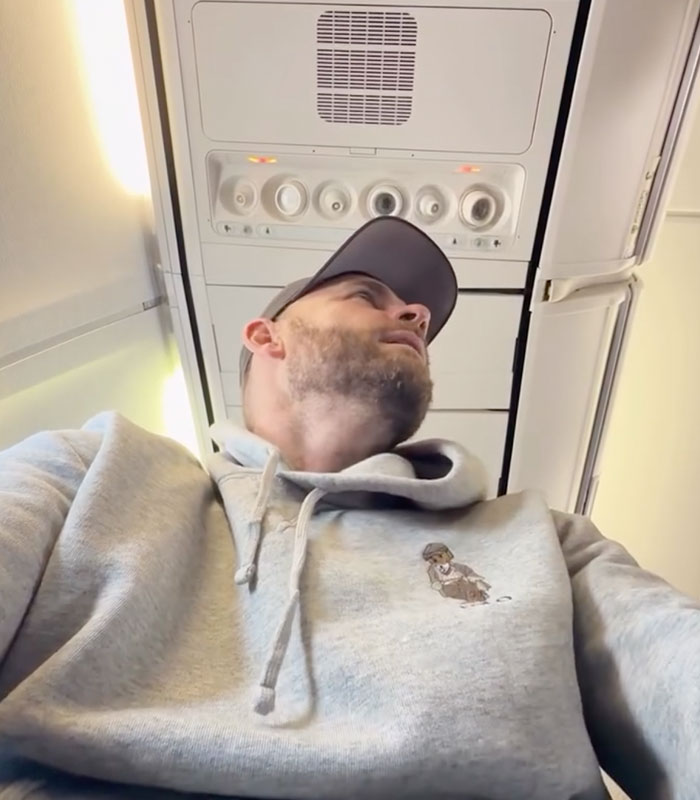 The wheelchair advocate looks up on the airline flight, reflecting on his experience. The wheelchair advocate looks up on the airline flight, reflecting on his experience.