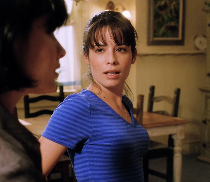 Charmed alum looking at another woman while talking, confirming her acting retirement. Charmed alum looking at another woman while talking, confirming her acting retirement.