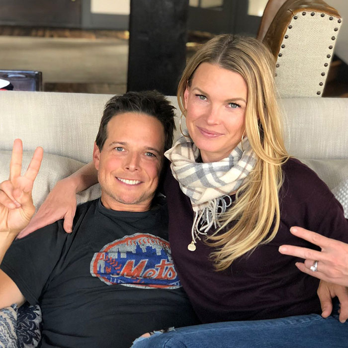 Scott Wolf and wife Kelley Wolf smiling, revealing life-changing diagnosis and emotional apology to actor. Scott Wolf and wife Kelley Wolf smiling, revealing life-changing diagnosis and emotional apology to actor.