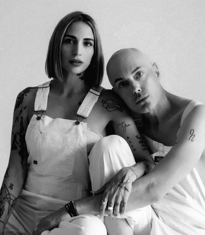 Angelina Jolie's brother and partner in a black and white photo, revealing a major secret.