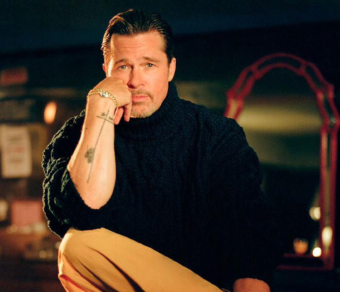 Brad Pitt in a pensive pose, focusing on his personal journey with sobriety and new approach to drinking. Brad Pitt in a pensive pose, focusing on his personal journey with sobriety and new approach to drinking.