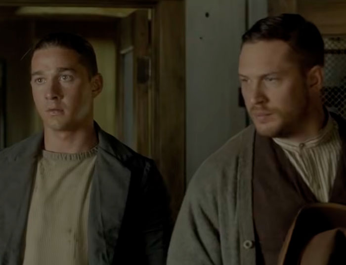 Shia LaBeouf and Tom Hardy in a movie still, highlighting the on-set confrontation with Scott Eastwood. Shia LaBeouf and Tom Hardy in a movie still, highlighting the on-set confrontation with Scott Eastwood.