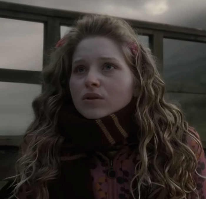 Harry Potter star looking thoughtful in a warm outfit. Harry Potter star looking thoughtful in a warm outfit.