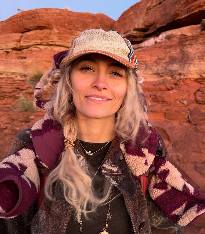 Paris Jackson in a scenic outdoor setting, opening up about Michael Jackson and his accusations. Paris Jackson in a scenic outdoor setting, opening up about Michael Jackson and his accusations.