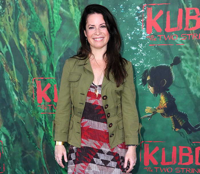 Charmed alum on a red carpet, smiling, after confirming her acting retirement. Charmed alum on a red carpet, smiling, after confirming her acting retirement.