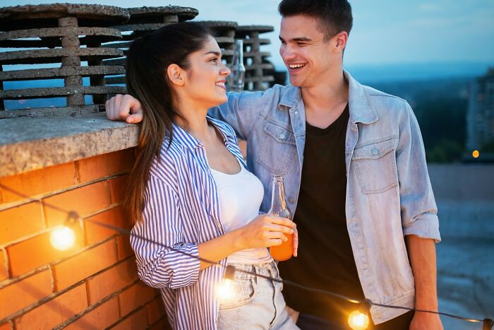 A happy couple on a rooftop, enjoying time together and the truths about being married.