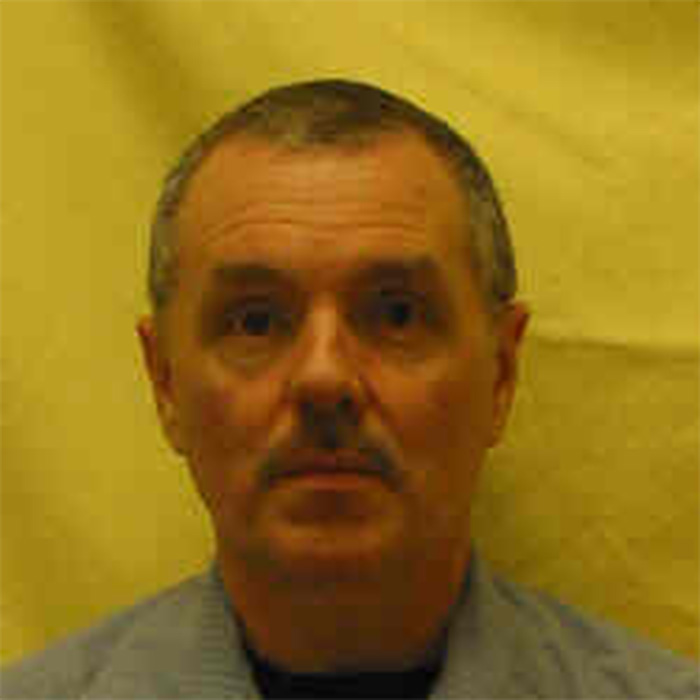 A mugshot of the nurse's aide, looking directly at the camera with a neutral expression. A mugshot of the nurse's aide, looking directly at the camera with a neutral expression.