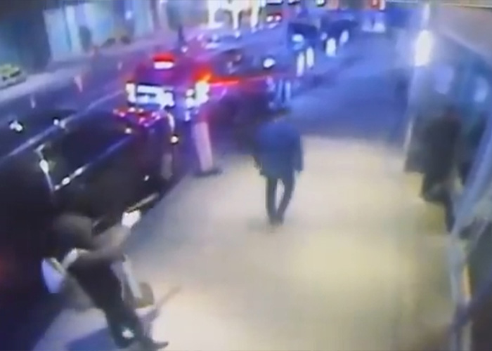 Luigi Mangione case update: Surveillance footage of a figure on a sidewalk near parked vehicles at night. Luigi Mangione case update: Surveillance footage of a figure on a sidewalk near parked vehicles at night.