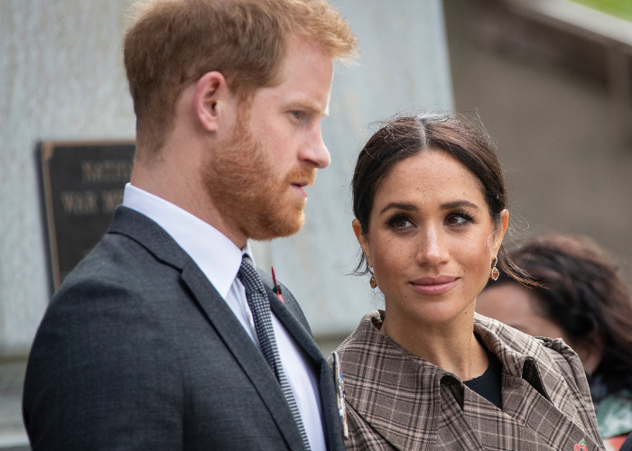 Meghan Markle looks at Prince Harry as their former US neighbors expose further revelations.