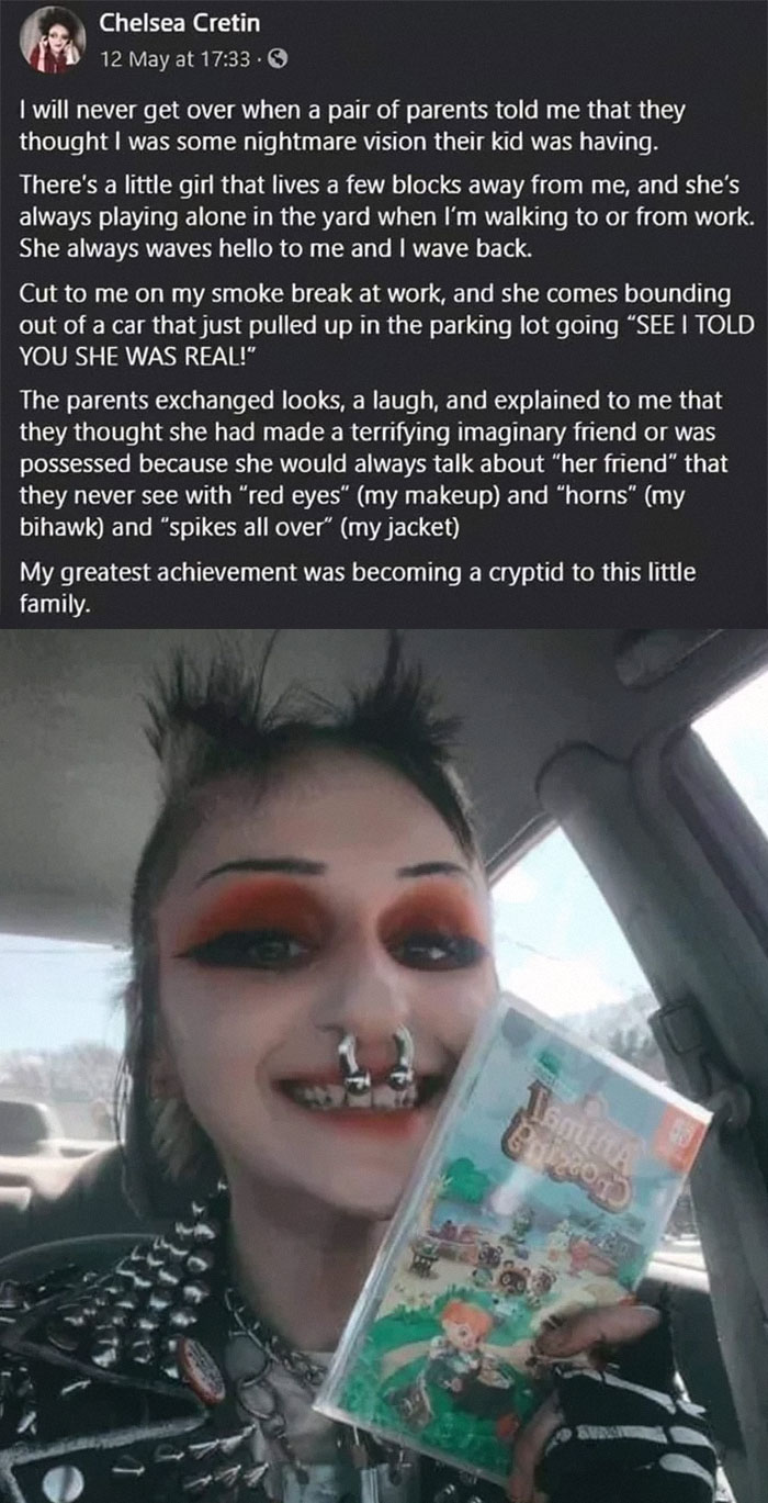 A woman with alternative style joyfully holds a video game, showcasing wholesome posts that make hearts full.