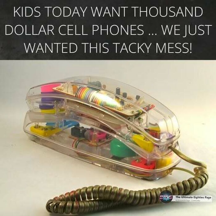 A transparent corded telephone, a nostalgic item from the '80s, highlighting how old many have become.