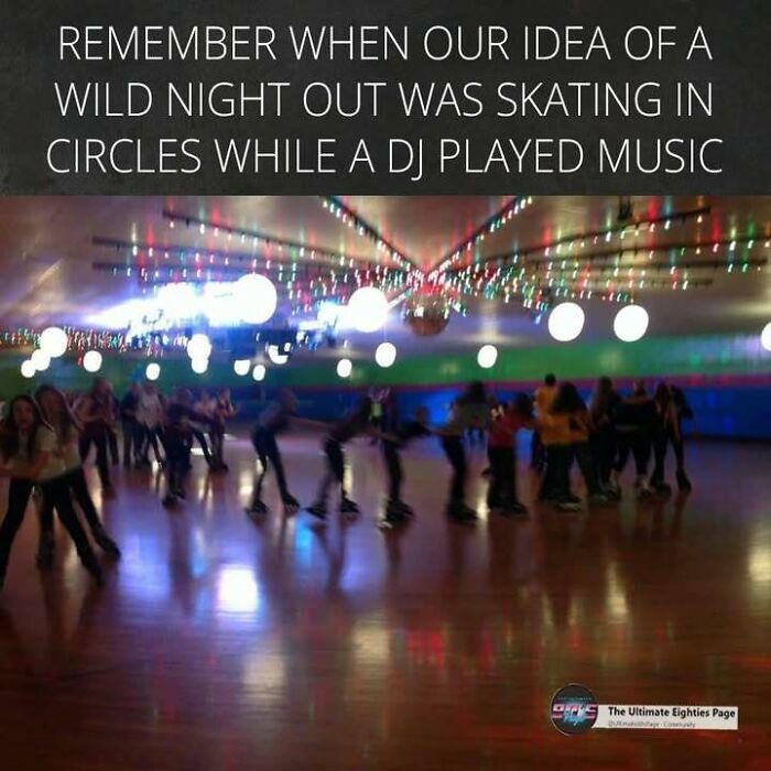 A blurred image of people roller skating in an arena with disco lights, evoking a fun '80s night out.