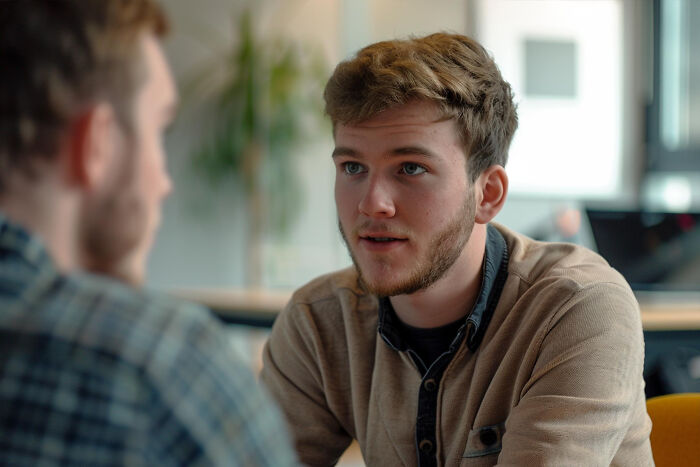 Two men talk; one reveals a secret they'd never confess, sharing a confidential moment.
