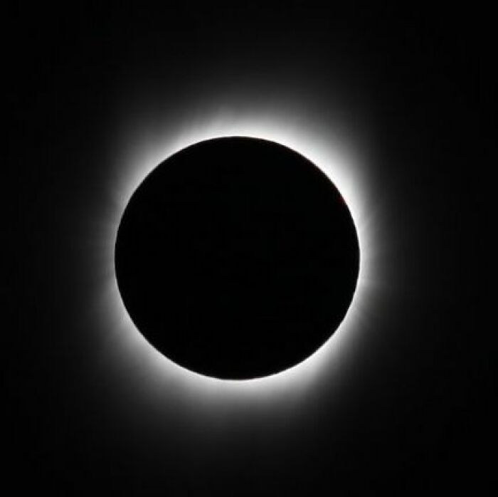 Extraordinary solar eclipse photo capturing the sun's corona during totality, making history.