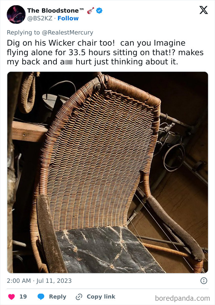 A close-up of a vintage wicker airplane seat from American history, showing its intricate weaving.