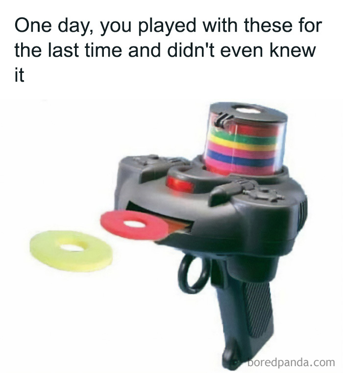 A black toy gun with colorful rings that people played with in the 90s and 00s, bringing back nostalgia.