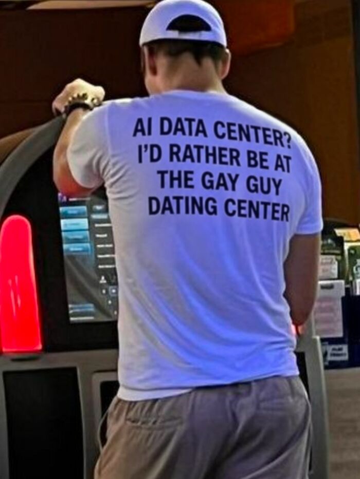 A white t-shirt with iconic shirts text: AI Data Center? I'd rather be at the gay guy dating center.