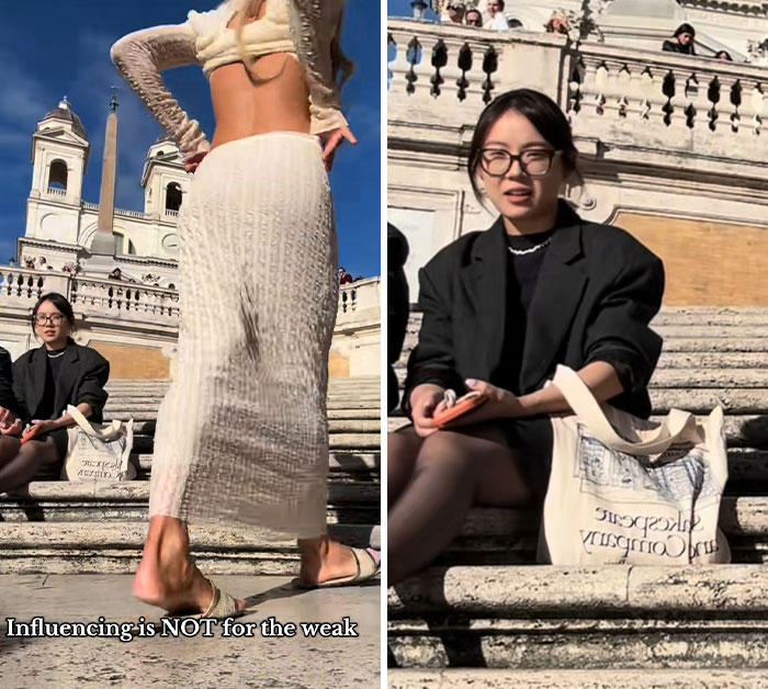 An influencer filming in public, walking up steps with a historic building in the background. A woman sits nearby. An influencer filming in public, walking up steps with a historic building in the background. A woman sits nearby.