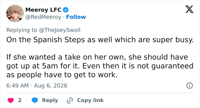 Screenshot of a social media reply about the influencer filming in public, Joey Swoll, on busy Spanish Steps. Screenshot of a social media reply about the influencer filming in public, Joey Swoll, on busy Spanish Steps.