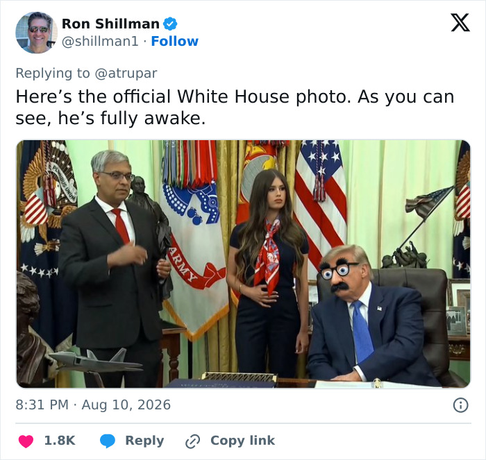 An official White House photo, altered with a mystery woman, Trump, and a strange gesture. An official White House photo, altered with a mystery woman, Trump, and a strange gesture.