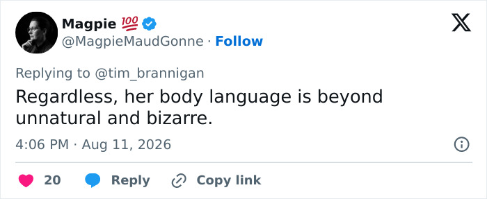 Tweet by MagpieMaudGonne speculating on the mystery woman's strange gesture and unnatural body language. Tweet by MagpieMaudGonne speculating on the mystery woman's strange gesture and unnatural body language.