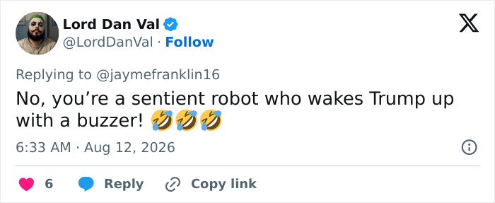 A social media post from 'Lord Dan Val' about the mystery woman behind Trump being a robot.