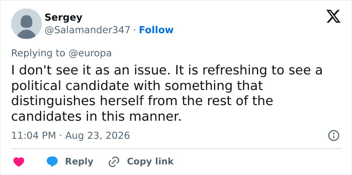 A tweet supporting a conservative politician for her provocative necklace on campaign posters, distinguishing her from other candidates. A tweet supporting a conservative politician for her provocative necklace on campaign posters, distinguishing her from other candidates.