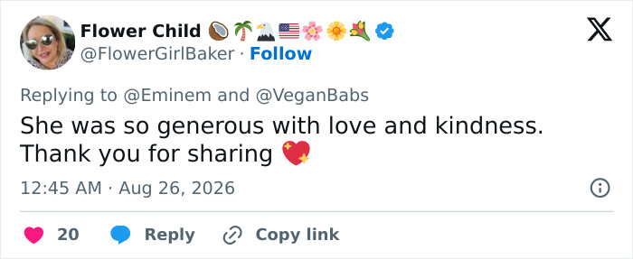 A tweet from Flower Child replying to Eminem and VeganBabs, praising Dolly Parton for her generosity, adding to Eminem's backlash.