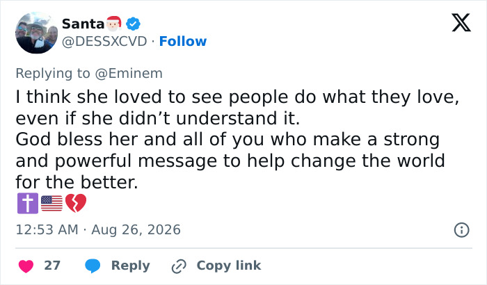 Twitter user Santa replies to Eminem, sharing thoughts on Dolly Parton loving to see people do what they love.