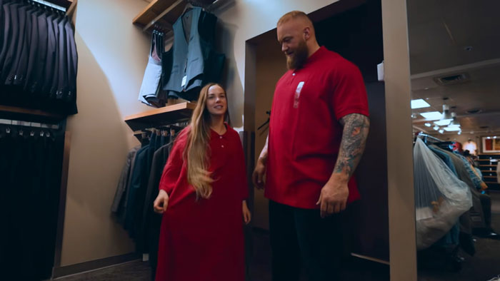Game of Thrones The Mountain, with his wife trying on oversized clothes. Game of Thrones The Mountain, with his wife trying on oversized clothes.