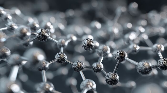 Abstract image of interconnected metallic spheres, representing molecular structure and healthy habits.