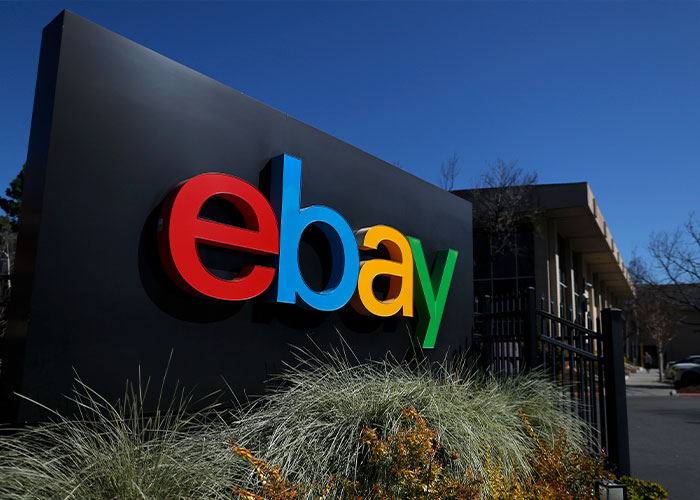Large eBay logo sign outside an office building, representing eBay's massive karma.