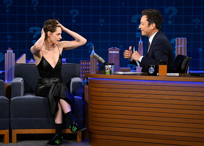 Kristen Stewart's unsettling appearance on Jimmy Fallon Show, seated and interacting with Jimmy Fallon.