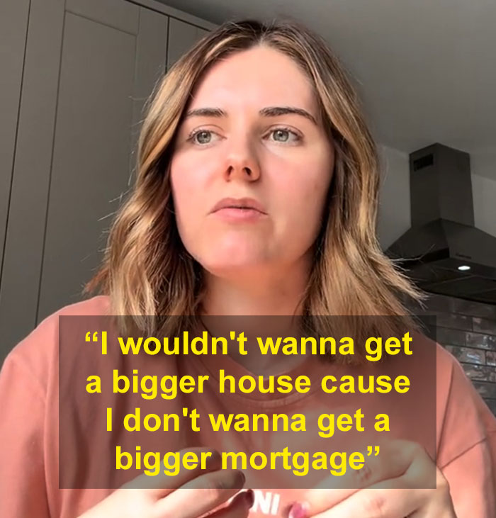 A woman explaining her reasons for not having kids, specifically avoiding a bigger house and mortgage. A woman explaining her reasons for not having kids, specifically avoiding a bigger house and mortgage.