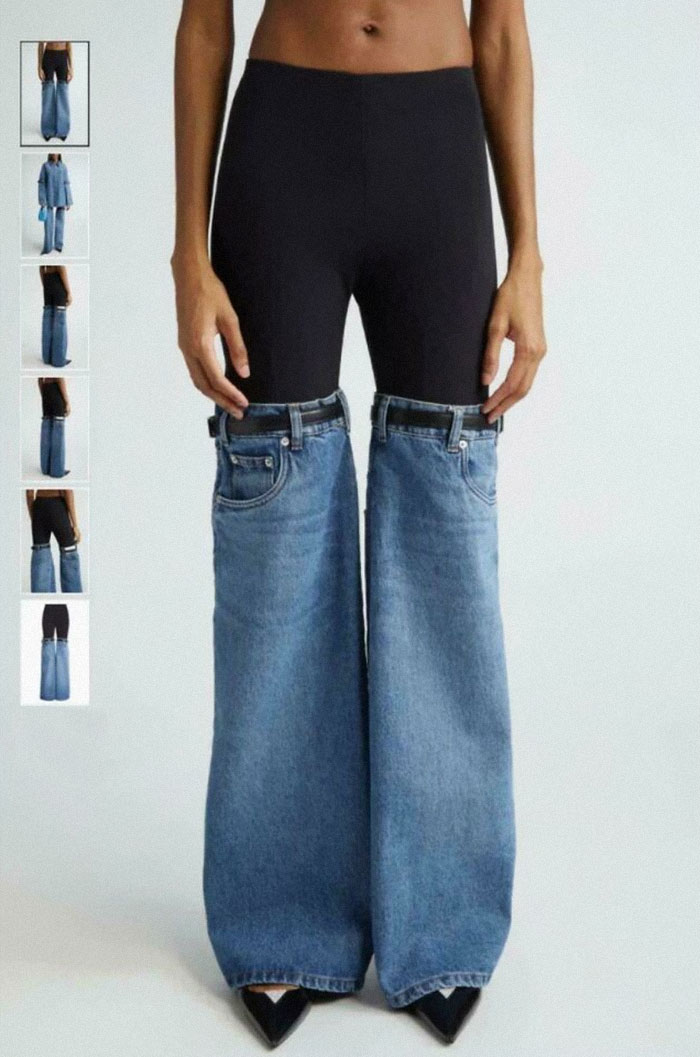 A model wearing black leggings with detached wide-leg denim jeans underneath, a hilariously bad fashion crime.