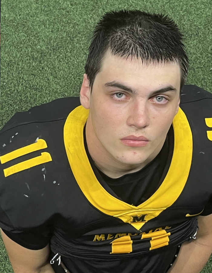 A male football player in a black and yellow jersey, connected to the Karmelo Anthony case and the unveiled evidence. A male football player in a black and yellow jersey, connected to the Karmelo Anthony case and the unveiled evidence.